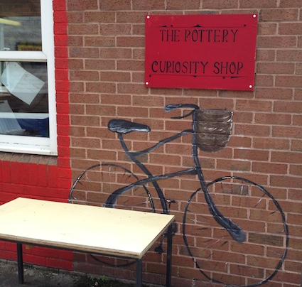 This image has an empty alt attribute; its file name is Curiosity-Shop-1.jpg